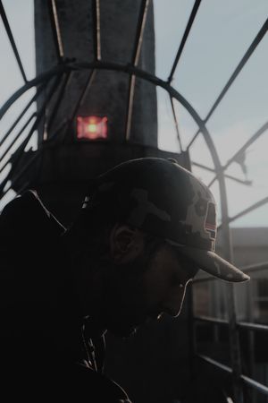 Modern man inside desolate building