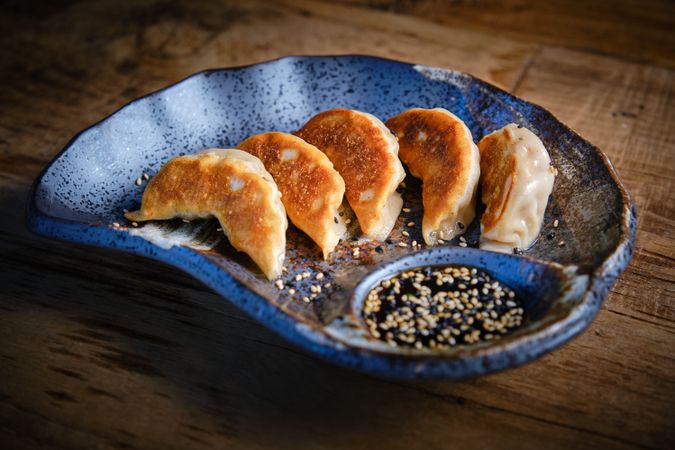 A typical Chinese dumpling that is very popular in China, Japan and Korea, as well as outside Asia. Jiaozi are stuffed with minced meat or vegetables and rolled into a thin, thin dough, which is usually sealed with the fingers.
