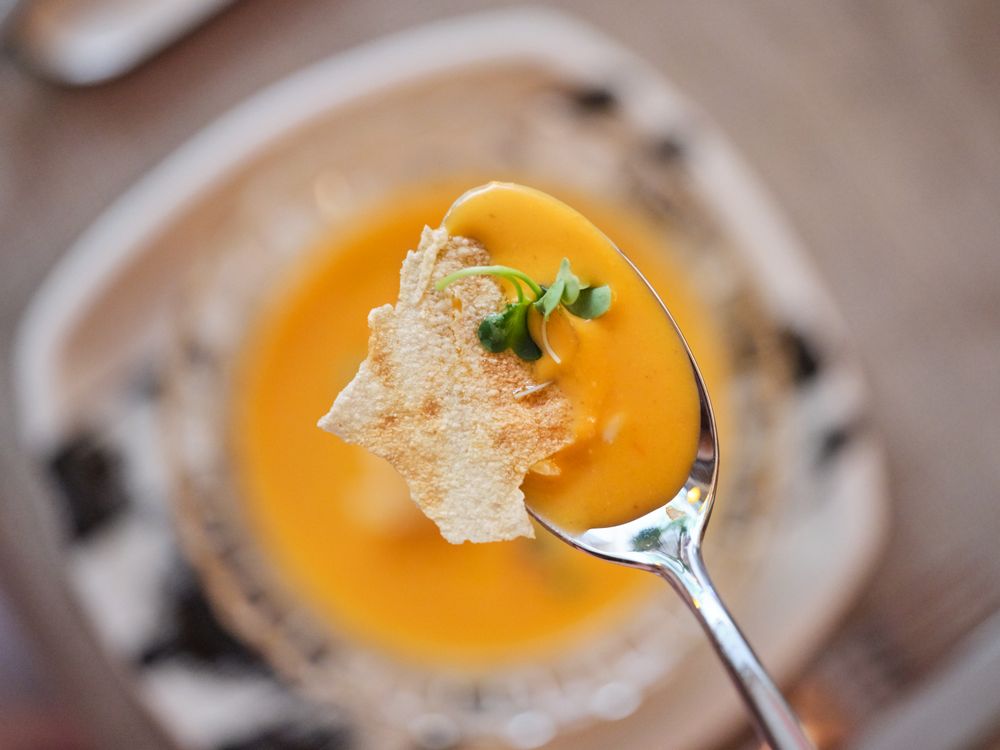 Delicious soup on blurred background