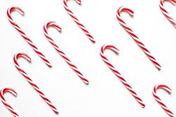 Candy Canes on a blank backdrop. Christmas background.