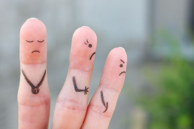 Fingers art of wife leaves a husband. The concept of divorce.
