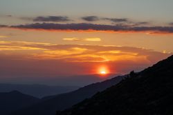 Beautiful bright sunset in mountains