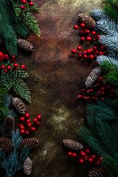 Xmas holiday card concept with branches and holly