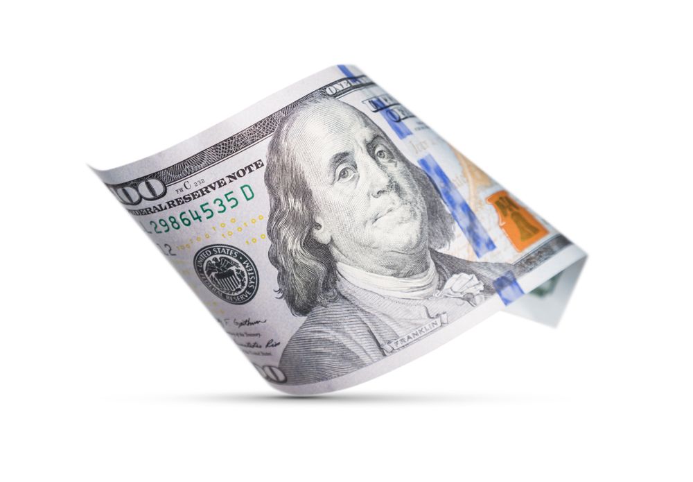 One Hundred Dollar Bill Floating Down To Surface with Drop Shadow