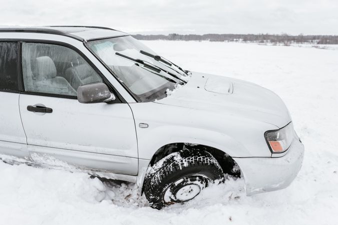 Car driving on snow field