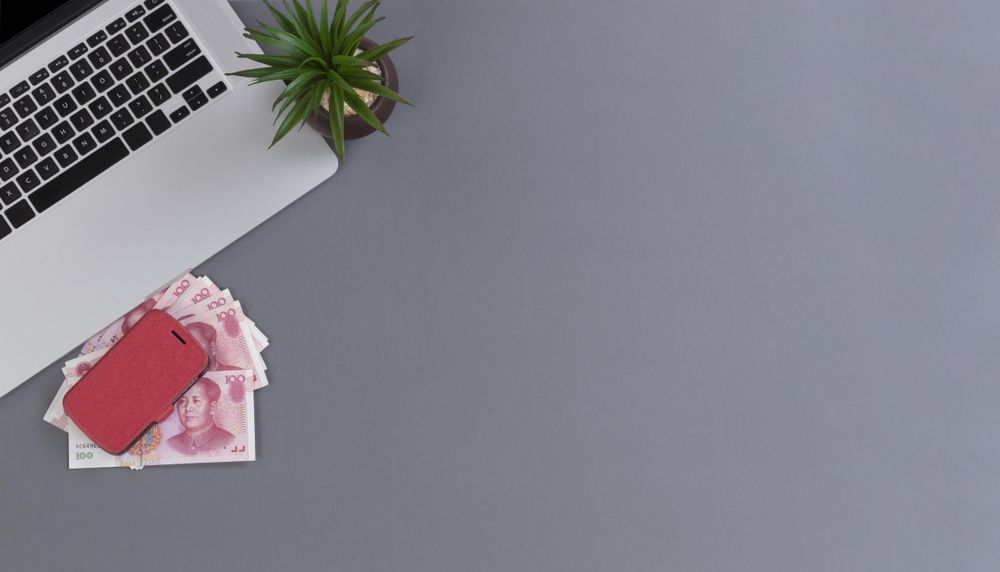 Desktop with Chinese currency and wireless technology