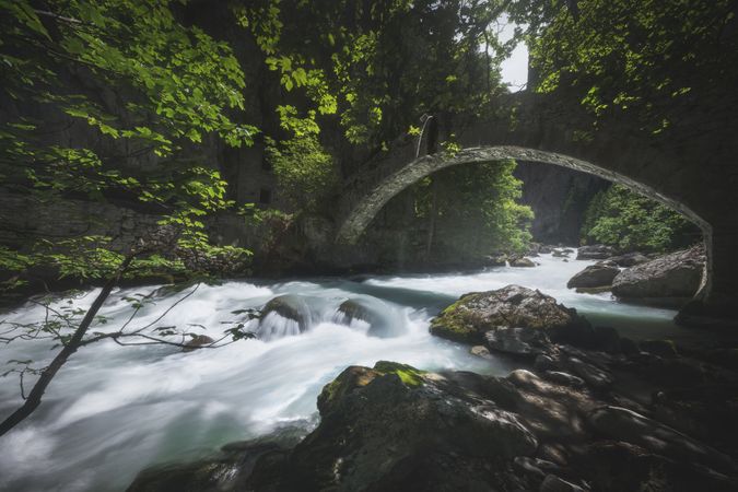 Bridge over the stream in the ravine of Pré Saint Didier, Aosta valley, Italy