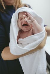 Newborn baby girl crying