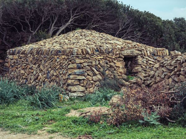 Rural hut of stone for farmer in countryside