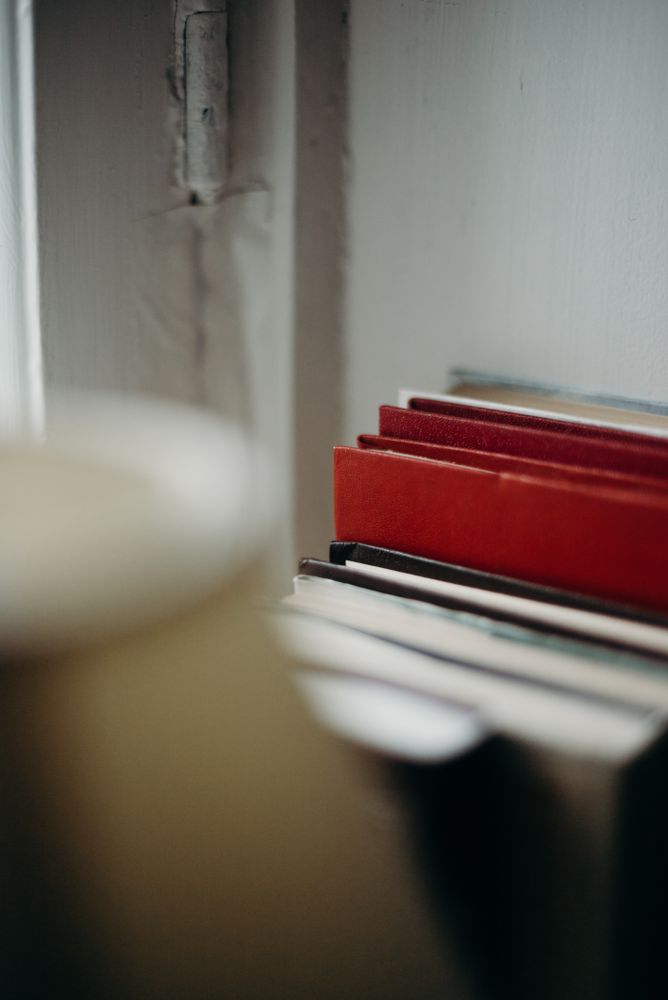 Hardbound books a table indoor