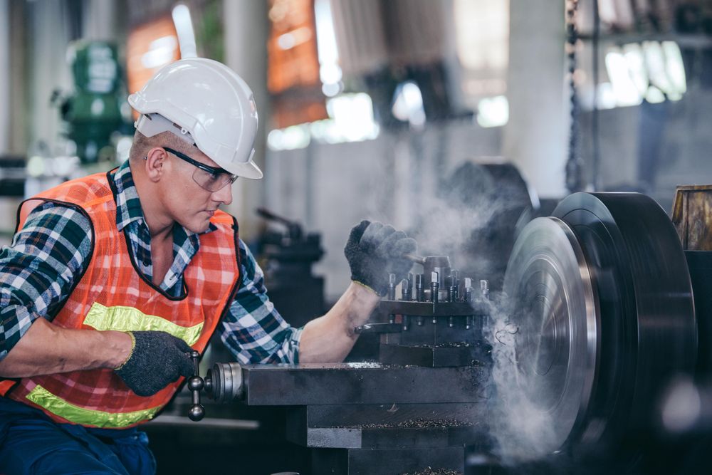 Male industrial engineer with equipment