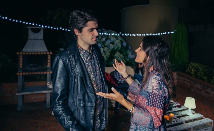 Couple having a fight at a party