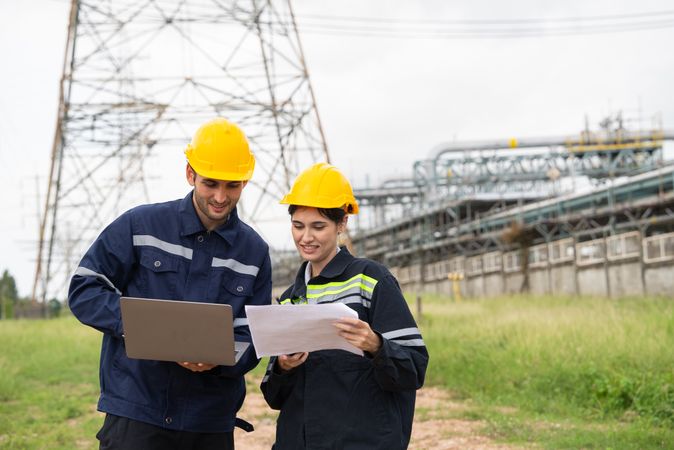 Engineer worker checking project at petrochemical factory or refinery oil plant industrial.