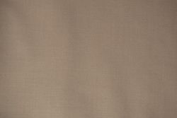 Detailed flat view Light brown pattern fabric texture background.