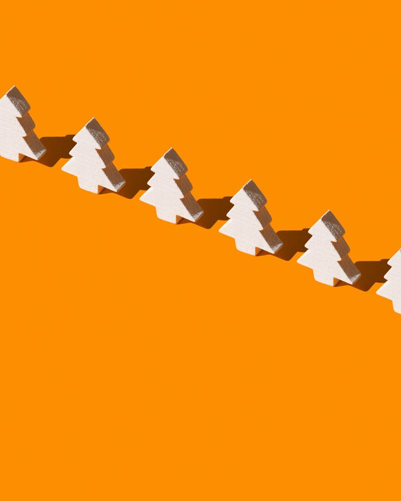 Pine tree shaped blocks on an orange background