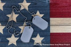 Close up of Military ID Tags on traditional USA nation colors 5k9pDb