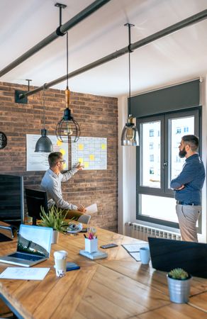 Manager organizing work in an office
