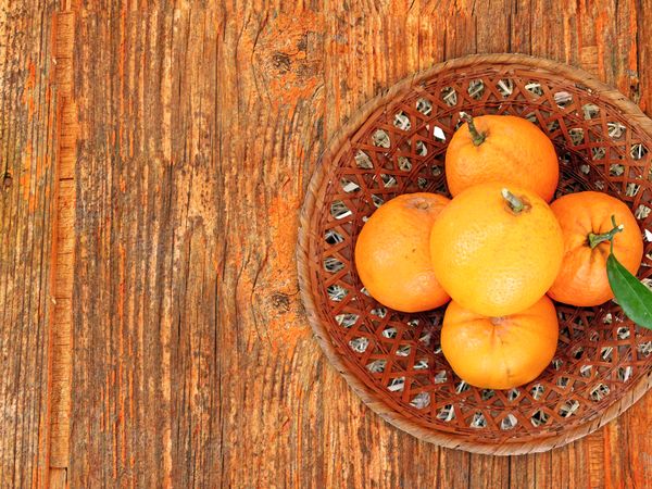 oranges on wooden background