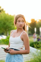 Teen girl using smartphone