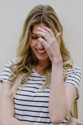 Lovely shy woman smiling