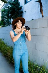 Female photographer concentrating while taking a picture