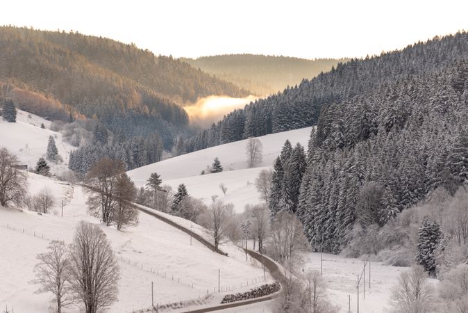 Snow covered  mountains at sunrise on a beautiful sunny day
