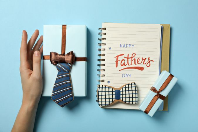 Happy father's day inscription, inscription in notebook, with gifts.