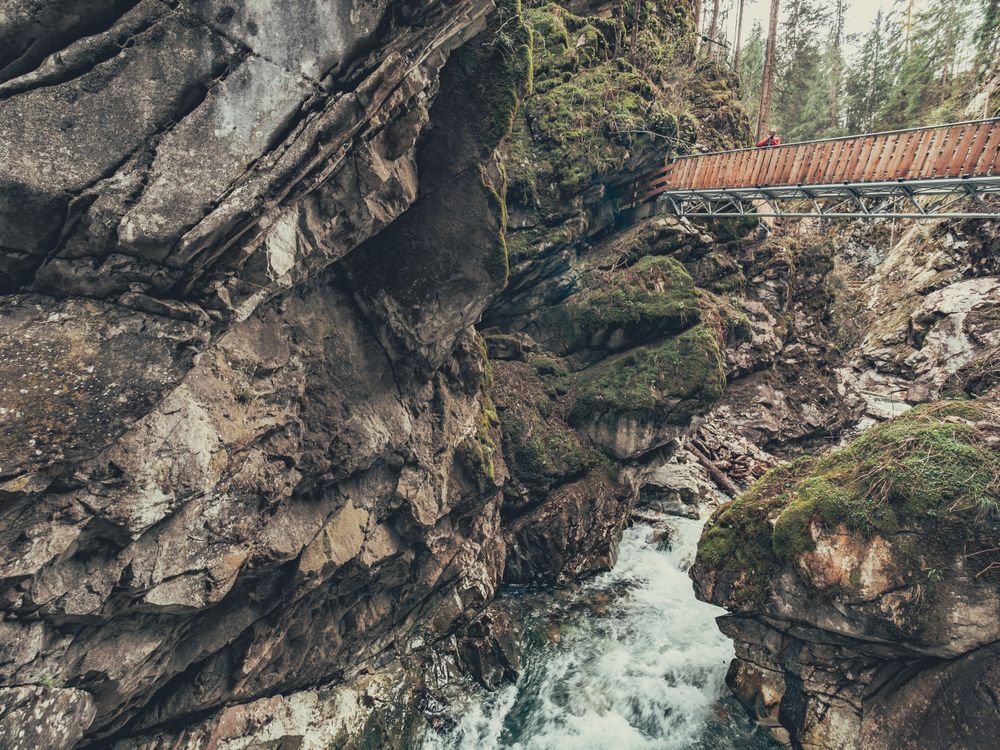 Bridge of tourist path among beautiful mountains