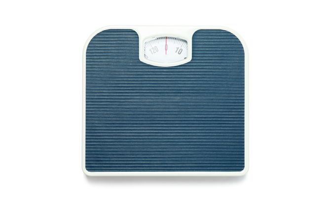 Blue weigh scales isolated on blank background