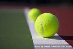 Tennis balls on baseline bY1y9b