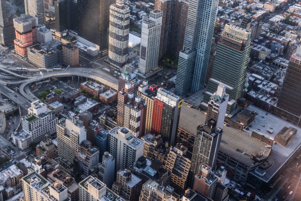Aerial New York City View of Manhattan Residential and Office Architecture. Daytime Photo from a Helicopter. Cityscape with Skyscrapers Near Central Park in Midtown Area