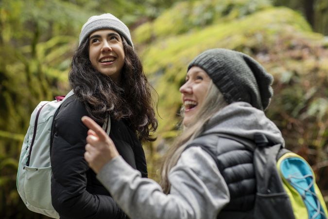 Happy  woman and young female outdoors