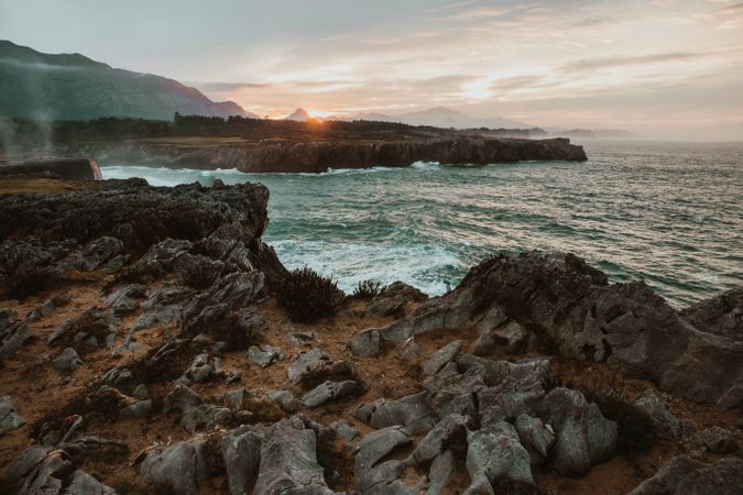 edge of cliff near water
