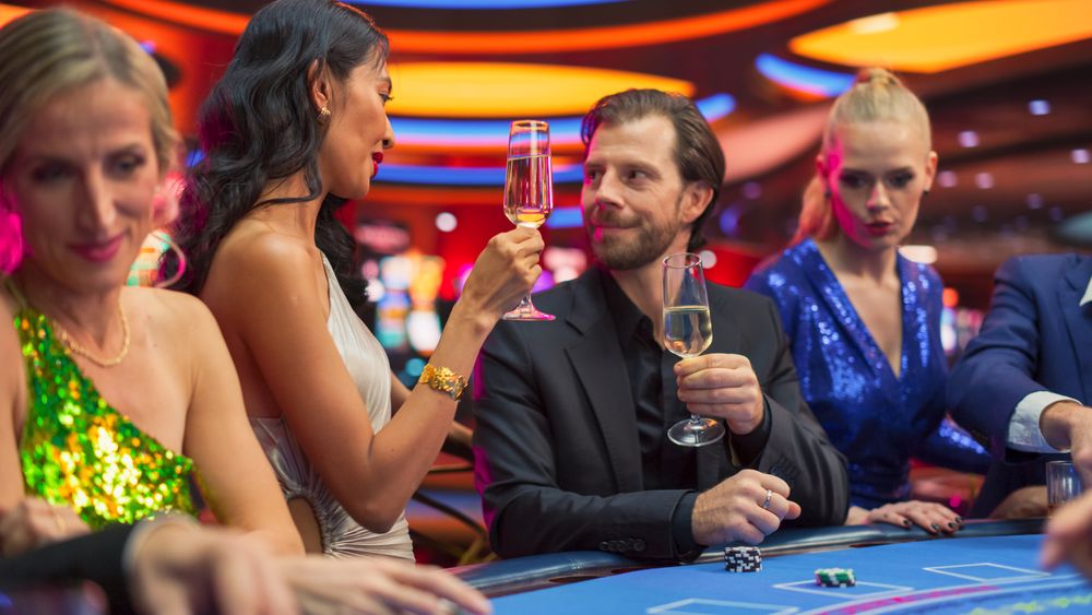 Fancy Couple Having Fun on Their Night Out in a Modern Casino.