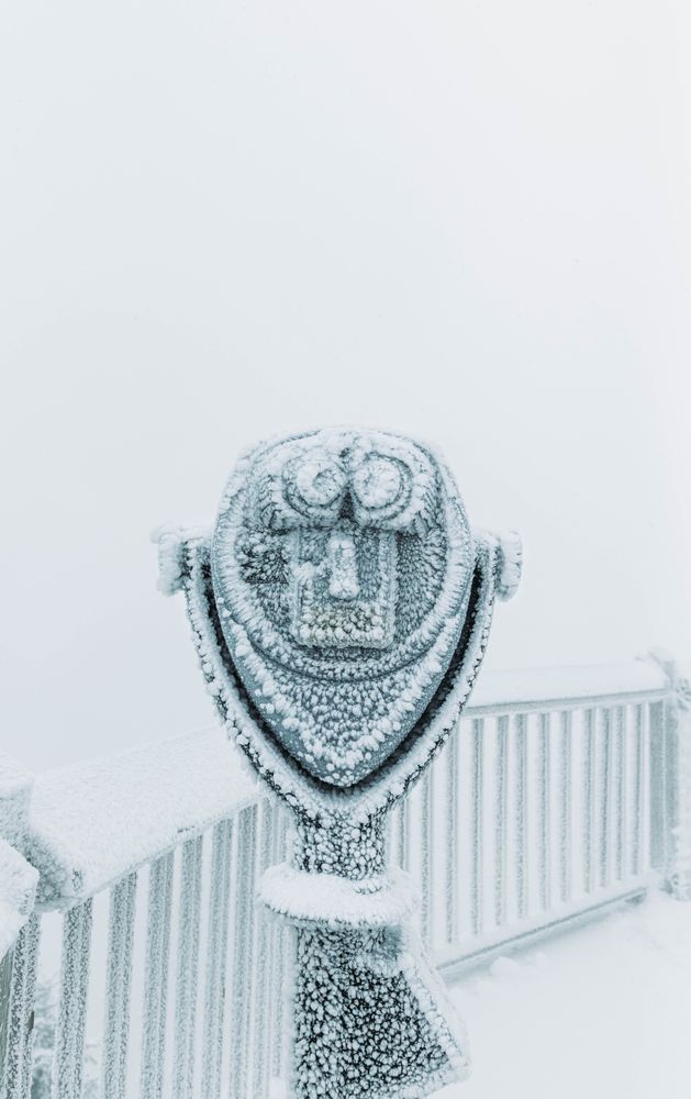 Binocular covered with snow