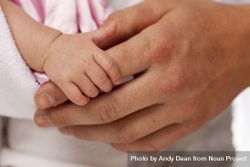 Baby Girl Hand Holding Rough Finger of Dad 0Ldnee