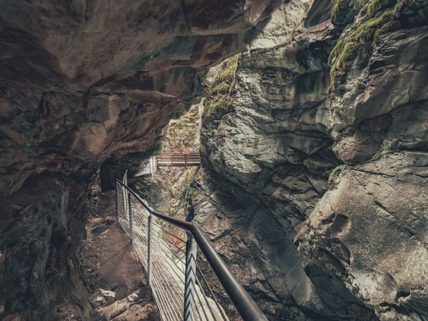 Hiking footpath with bridge in mountain area