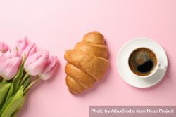 Tulips, croissant and cup of coffee on pink background, top view 47vGB5