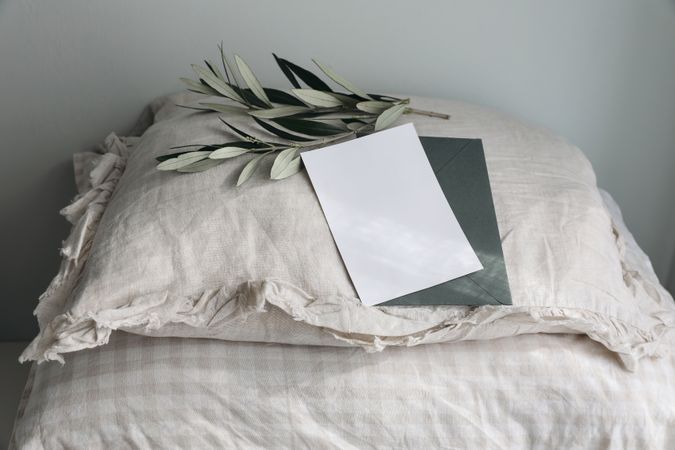 Fluffy beige linen, cotton gingham pillows with greeting card mockup