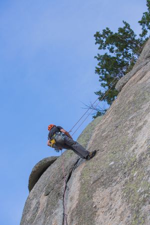 Man climbing a rock