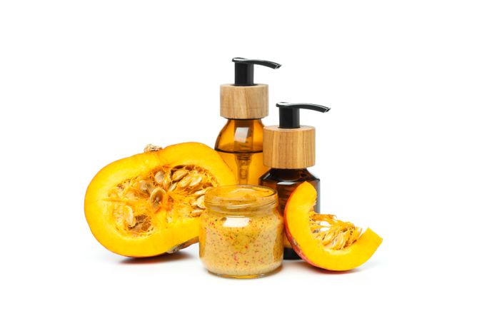 Concept of different cosmetic products, Pumpkin cosmetics, isolated on plain background