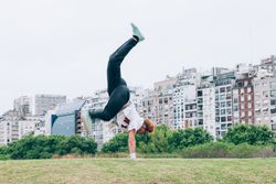 Sportsman practicing hip hop on lawn
