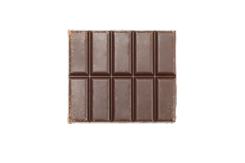 Tasty chocolate bar isolated on studio background