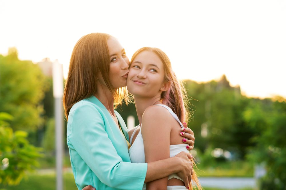 Mom And Teen Daughter Outdoor