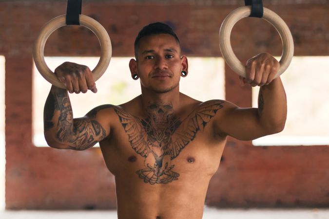 male athlete with gymnastic rings