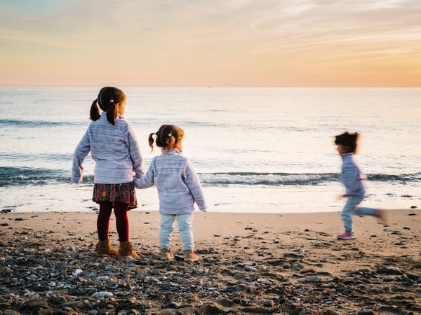 kids playing at the beach