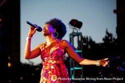 Los Angeles, CA, USA - July 12, 2012: Nailah Porter singing into microphone during a performance 0KBoYb