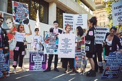 London, England, United Kingdom - September 15th,2019: Protesters standing with signs