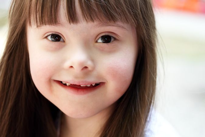 Portrait of a girl with Down syndrome