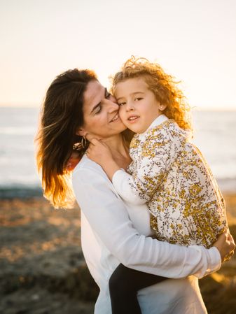 Mother with her daughter at beach
